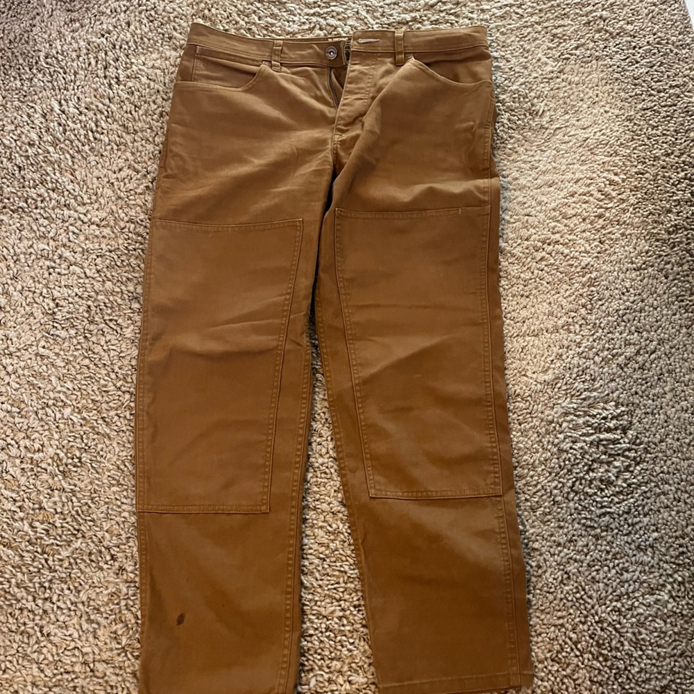REI Collective canvas work pants.